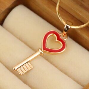 "Heart-Shaped Key Design Rose Gold Pendant with Red Enamel Accent, XPPT1280